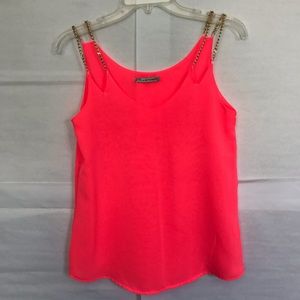 Fluorescent colored top